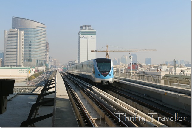 Dubai Metro train approaching Karama station.