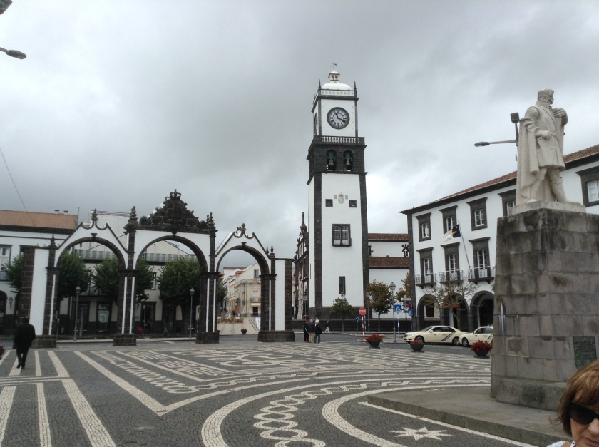 One of the main squares in Ponta Delgada featuring Igreja Matriz de São Sebastião and the City Gates.